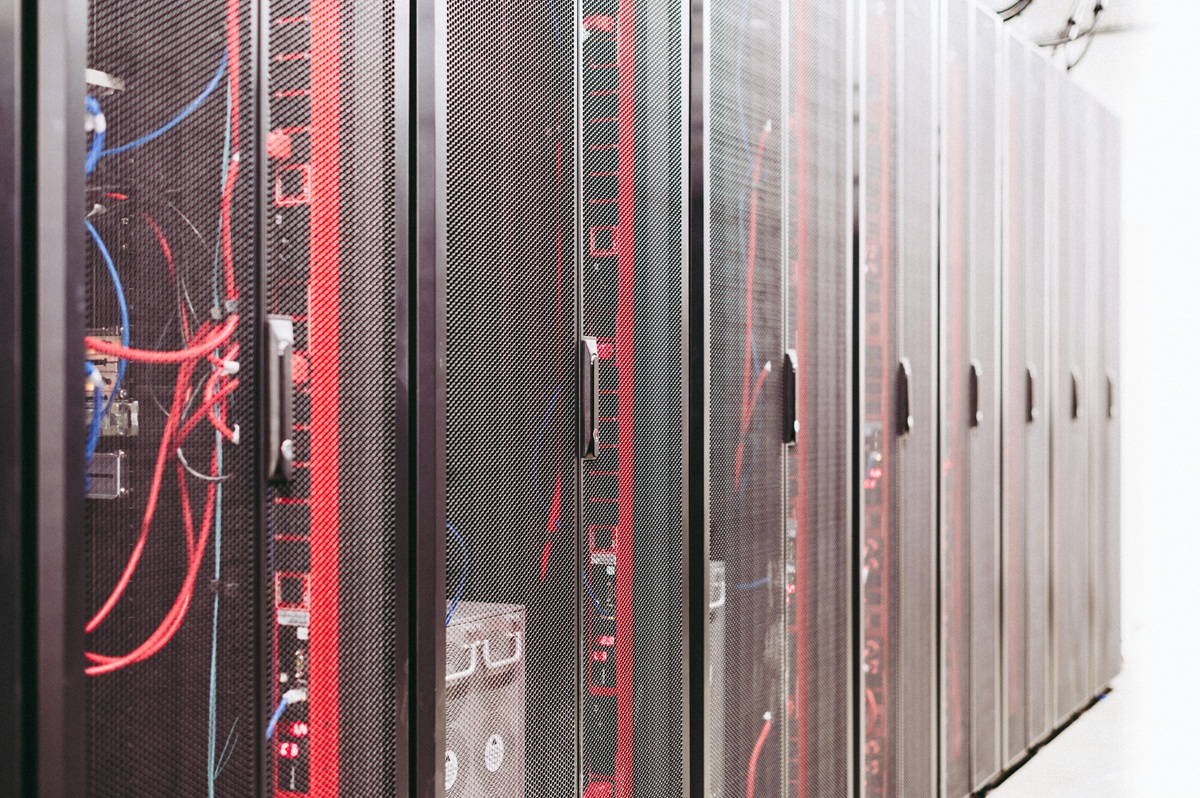 Modern data server room with network racks and cables