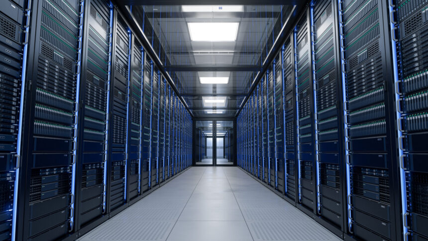 Modern data centre with rows of server racks in a climate-controlled server room.