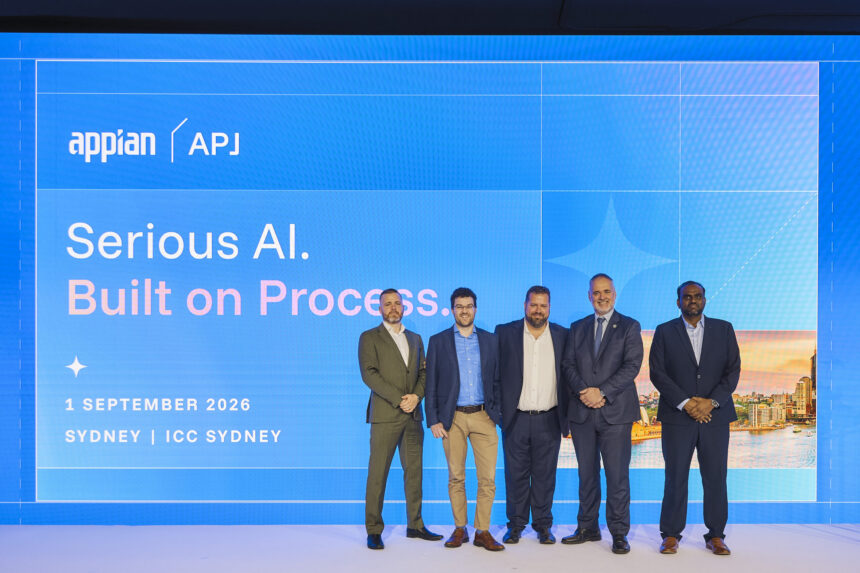 Five men standing on stage at the Appian APJ event in Sydney, in front of a screen displaying “Serious AI. Built on Process.”
